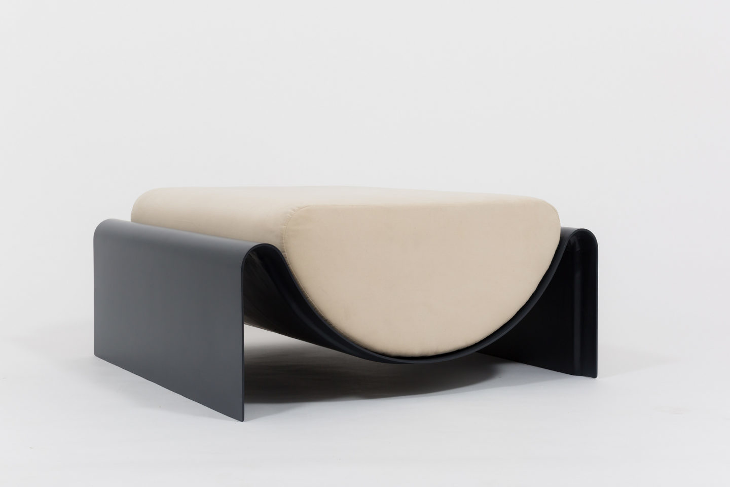 Ottoman in fiberglass with a semi-cylindrical cushion for Indoor-Outdoor use designed by Asa Pingree