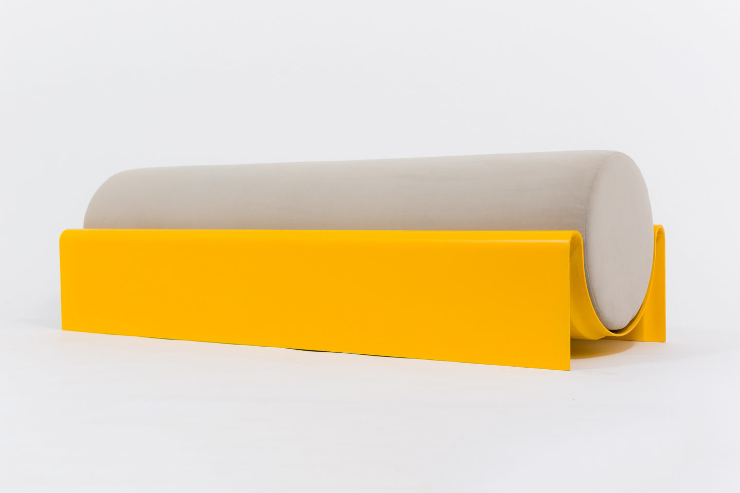 Bench in fiberglass with a cylindrical cushion for Indoor-Outdoor use designed by Asa Pingree